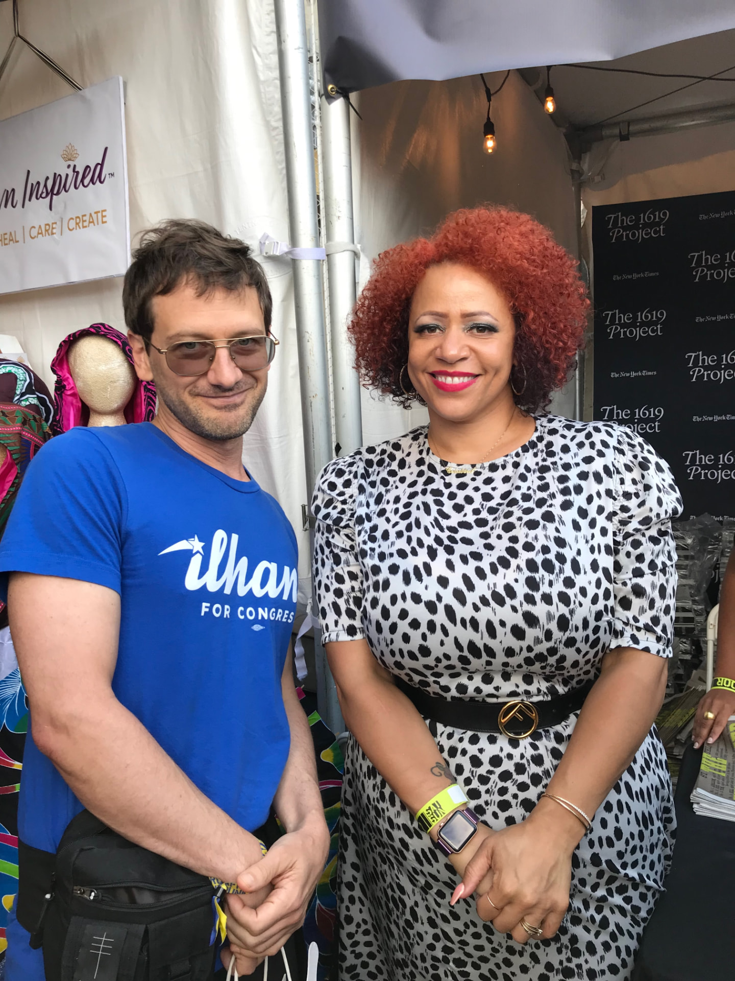 Disco Brian Davis with journalist Nikole Hannah-Jones at the 1619 Project booth at AfroPunk in Commodore Barry Park, Brooklyn