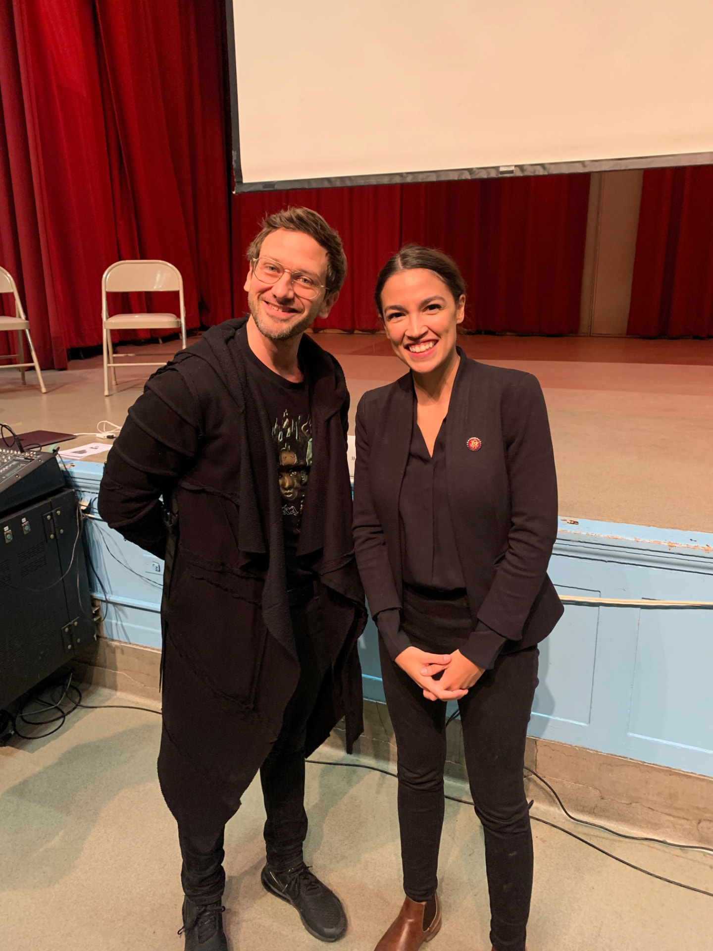 Disco Brian Davis with Rep. Alexandria Ocasio-Cortez at a Bronx town hall
